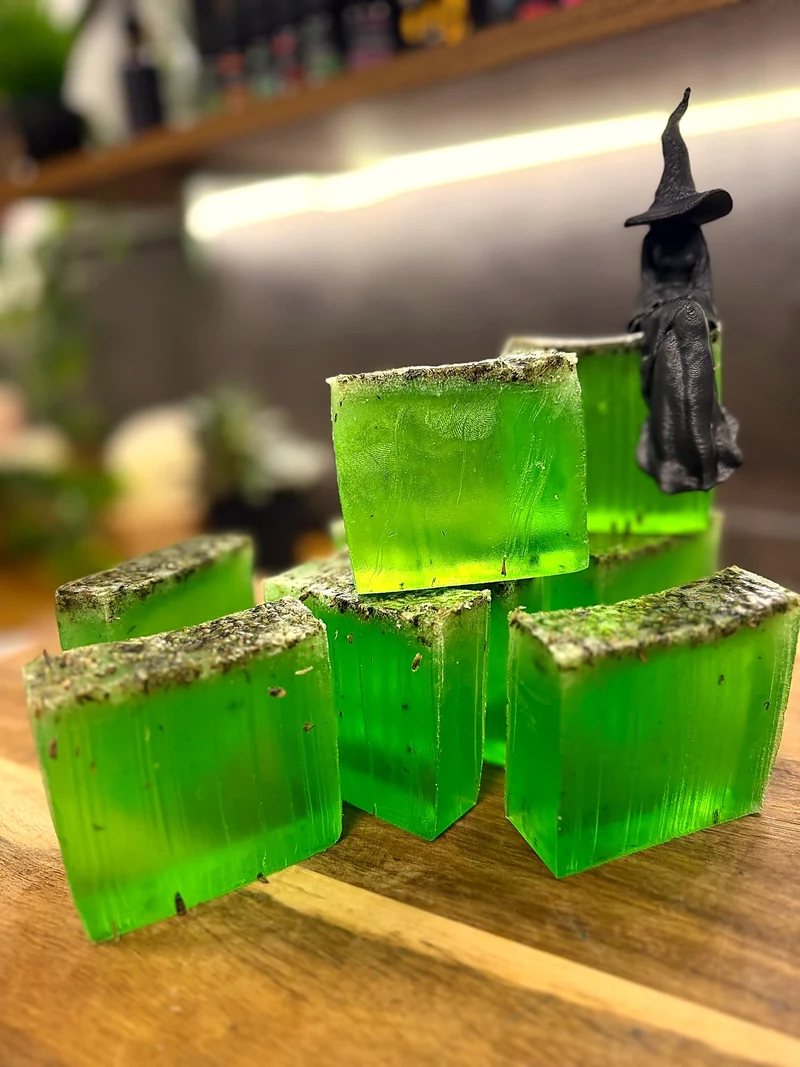 A freshly poured batch of green Energy Cleansing soap setting on the workbench.