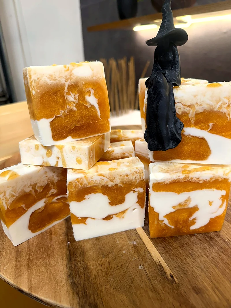 A freshly poured batch of golden Prosperity soap setting on the workbench.